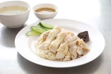 Thai food gourmet steamed chicken with rice khao mun kai in wood background