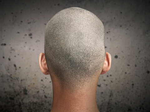 Young man with a shaved head