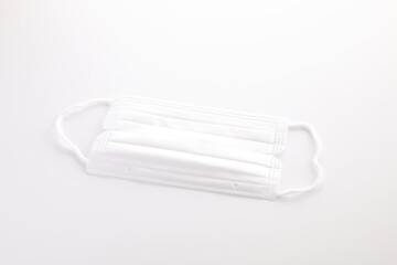 Used white mask isolated in white background