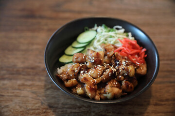 japanese food Chicken teriyaki with rice on wood background