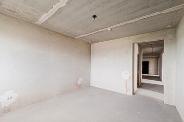 Russia, Moscow- April 17, 2020: interior room apartment rough repair for self-finishing. interior decoration, bare walls of the premises, stage of construction