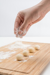 Asian women are making glutinous rice balls