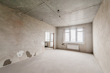 Russia, Moscow- April 17, 2020: interior room apartment rough repair for self-finishing. interior decoration, bare walls of the premises, stage of construction