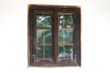 the windows of an old house in romania, houses that are still found in rural areas that have kept the tradition