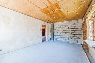 Russia, Moscow- April 17, 2020: interior room apartment rough repair for self-finishing. interior decoration, bare walls of the premises, stage of construction