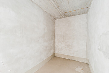 Russia, Moscow- April 17, 2020: interior room apartment rough repair for self-finishing. interior decoration, bare walls of the premises, stage of construction