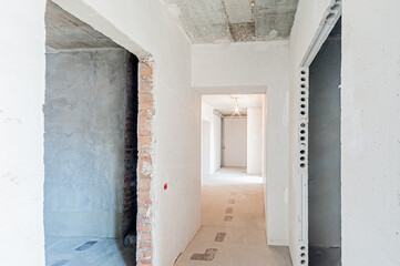 Russia, Moscow- April 17, 2020: interior room apartment rough repair for self-finishing. interior decoration, bare walls of the premises, stage of construction