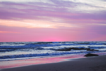 Beautiful dark pink sky evening beauty and Clouds at sunset , dawn, the rays of the sun break through the clouds. Natural