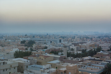 Fototapeta premium Aerial view of dawn of Riyadh with building rooftops