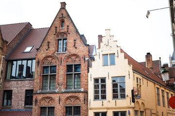 BRUGES, BELGIUM - April 13, 2018: Antique building view in Old Town Bruges, Belgium