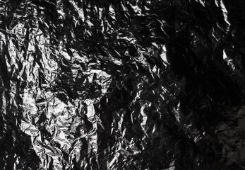 texture of dark crumpled polyethylene background