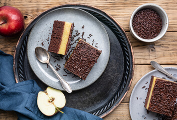 Chocolate dessert with creamy apple filling, topped with crispy sprinkles