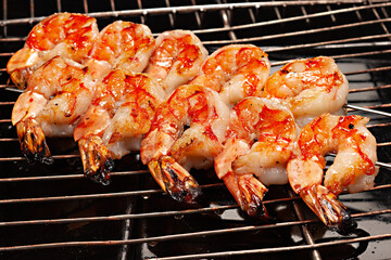 grilled shrimps on a grill	