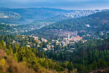 Fototapeta premium Green Judean hills around Ein Karem neighborhood, biblical birth place of John the Baptist, with Catholic Church of Saint John the Baptist; Jerusalem Israel