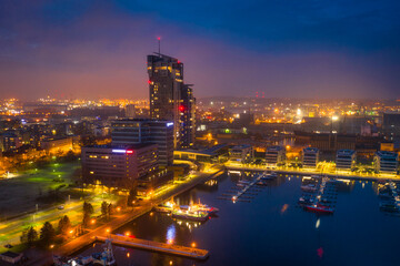 Fototapeta premium Cityscape of Gdynia by the Baltic Sea at dusk. Poland