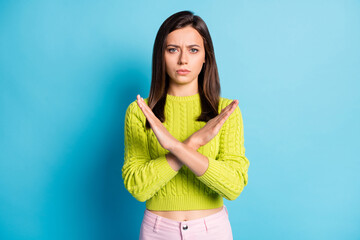 Photo of young beautiful unhappy dissatisfied displeased girl woman crossed hands no gesture...