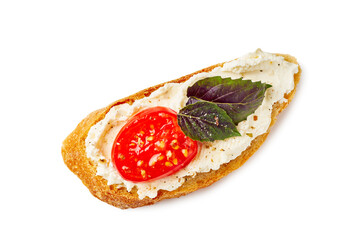 Bruschetta with cream cheese tomato and basil on white