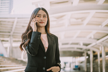 Young beautiful businesswoman talking on the phone.