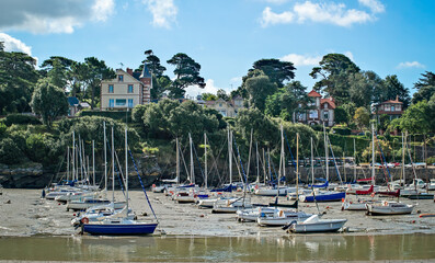 Fototapeta na wymiar The town of Pornic on the Atlantic coast in France with the harbor and boats at low tide.