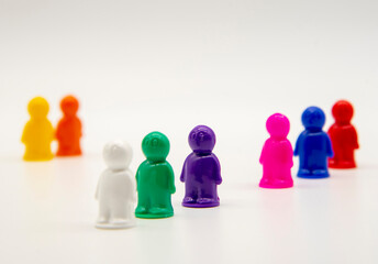 Small plastic men on a white background.