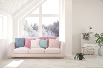 Fototapeta premium White living room with sofa and winter landscape in window. Scandinavian interior design. 3D illustration