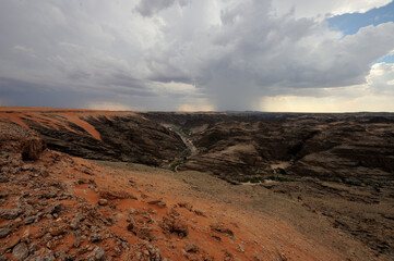 Fototapeta na wymiar A rain storm over the Kuiseb River in the Namib Desert