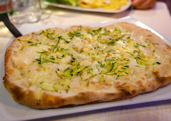 Pinsa romana, traditional italian food in Roma, variety of pizza