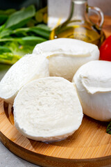 Fresh handmade soft Italian cheese from Campania, white balls of buffalo mozzarella cheese made from cow milk ready to eat