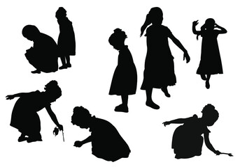 Eight vector silhouettes of little girls playing isolated on white background. 