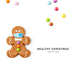 Fototapeta premium Gingerbread man with medical mask