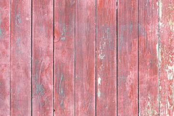Fototapeta premium Abstract wooden background with old peeling red paint.