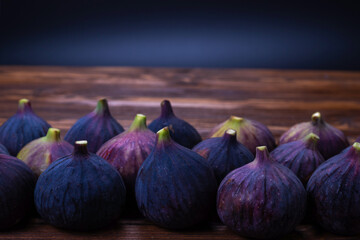 Tasty figs on a black background. Top view.