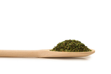 Dry mint in wooden spoon isolated on white.