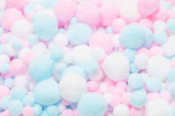 White, pink and blue soft pompons.