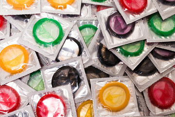Colorful condoms background.