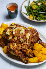 Whole roast chicken  with Indian spices and yogurt and almond masala