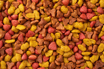 Dry food for cats. Abstract background.