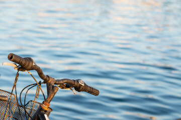 Rusty bike handlebar by the sea