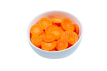 Top view of frozen sliced carrots in a bowl against white background