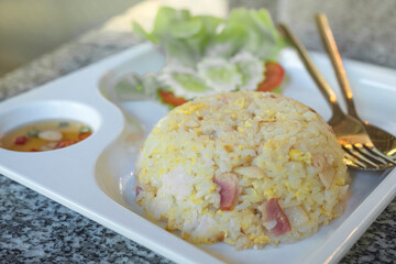 Close up of Fried rice with bacon and egg