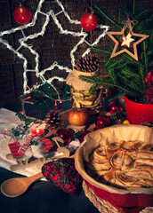 Apple pie on the table decorated in Christmas style