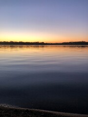 Obraz premium sunset over the river