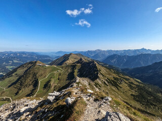 Fototapeta premium Beautiful view from the Fellhorn on a mountain ridge in the Kleinwalsertal Austria on a sunny day - Landscape Photography