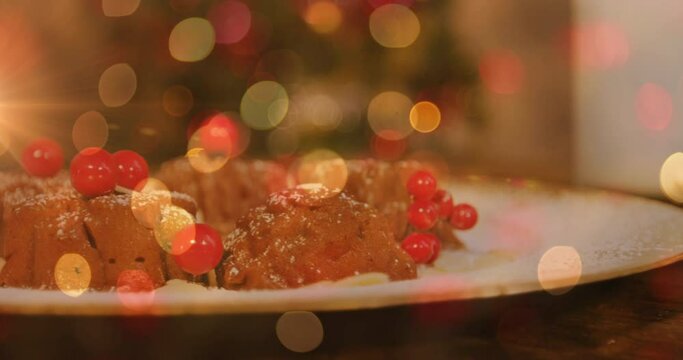 Animation of plate with christmas pudding and glowing lights