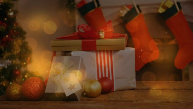 Animation of decorated christmas tree, presents and christmas stockings