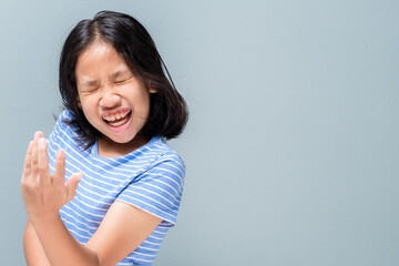 Ten years old girl acting cheerfully while singing and dancing like her favourite singer star