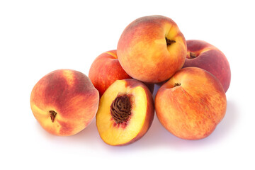 Fototapeta na wymiar Whole peaches and half isolated on white