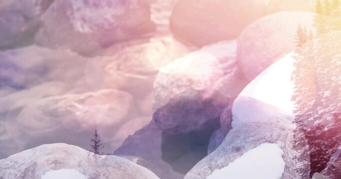 Animation of stones covered with snow over winter scenery