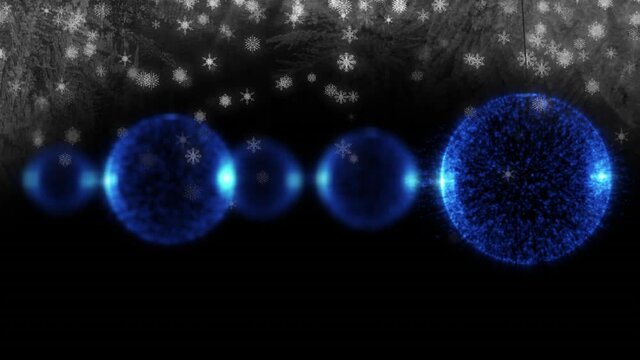 Animation of blue christmas baubles and snowflakes on black background