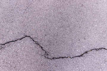 Obraz premium Close-up concrete asphalt exterior cracked seamless patterned texture